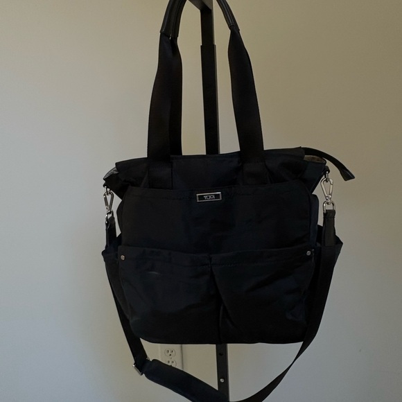 Tumi Handbags - Tumi Convertible Messenger Tote - a “does it all” bag in great condition.